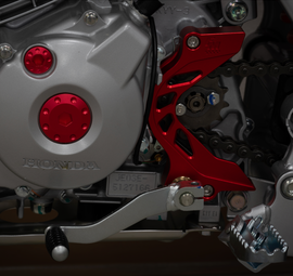 FM SHIFT SHAFT BRACE / SPROCKET GUARD - CRF125F